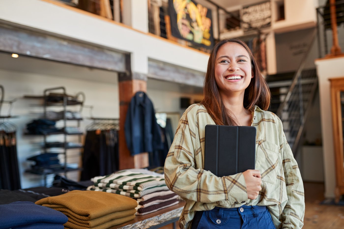 Happy female retail worker