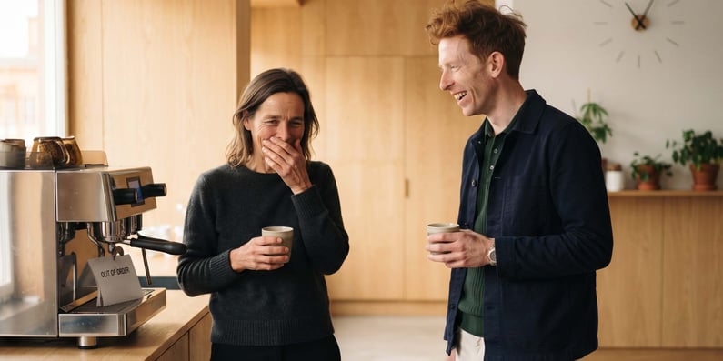 Two HR managers talking over coffee