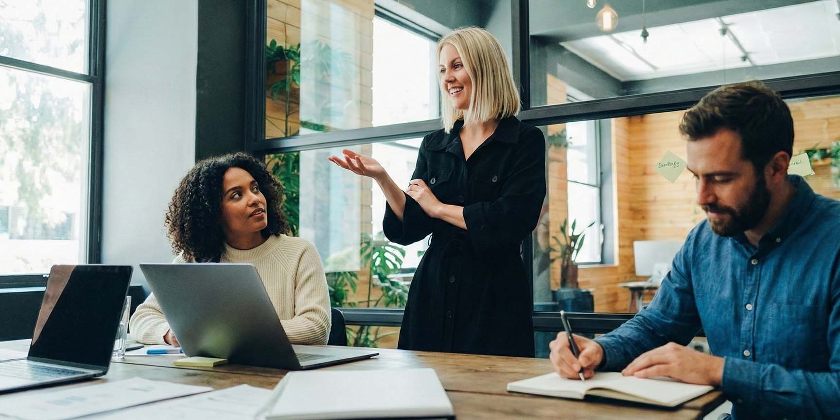 A manager holding a scheduling meeting