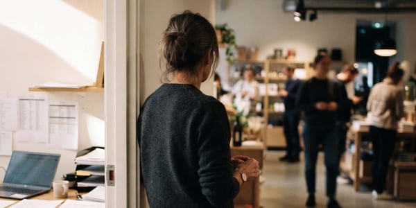 An HR manager looking out on the shop floor