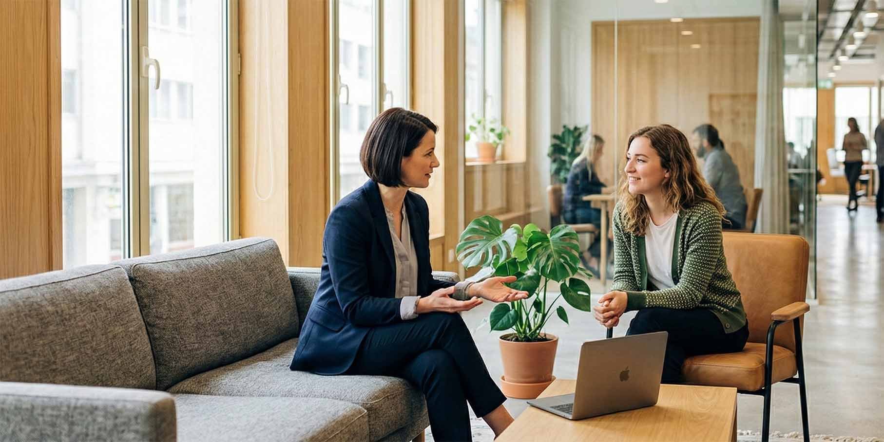 Two women having a development talks in the lounge