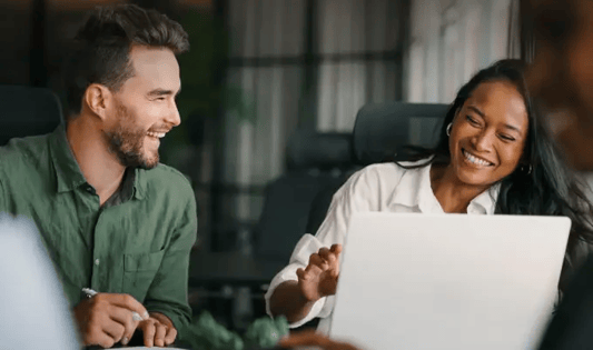 AI automation that saves hours every week, colleagues laughing together