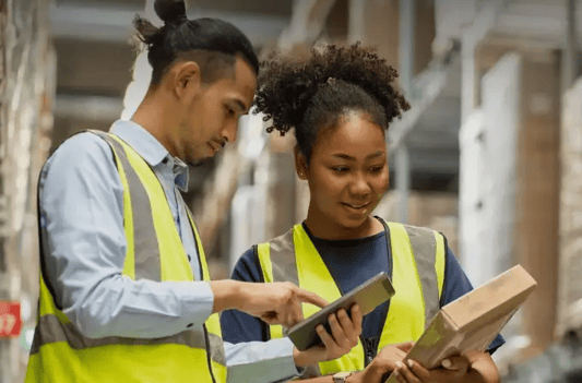 Faster rollouts, fewer errors, colleagues looking at work together